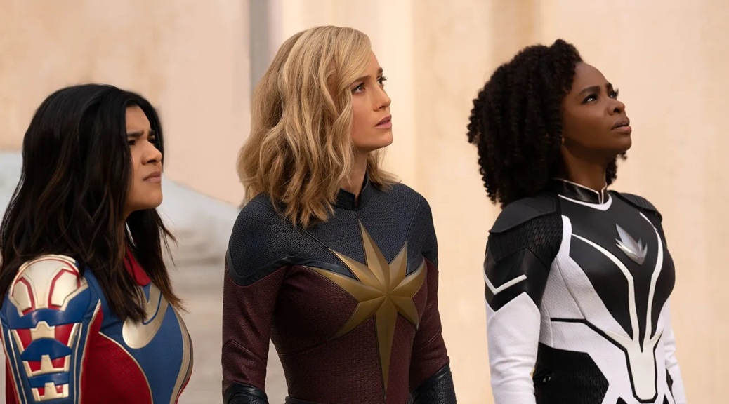 Iman Vellani, Teyonah Parris, and Brie Larson look concerned in "The Marvels".